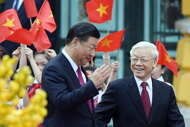 越中两国领导互致新年贺信